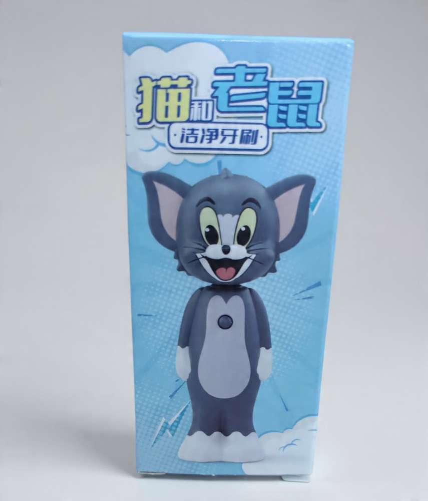 TOM TOOTHBRUSH